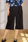 Dorika Bermuda Lang Shorts - Black